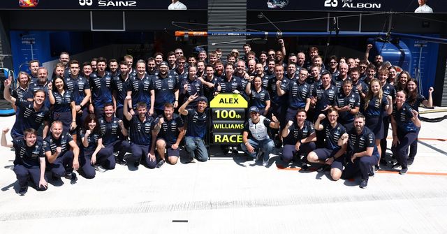 Alex Albon and Carlos Sainz celebrate Albon racing 100 times for Williams