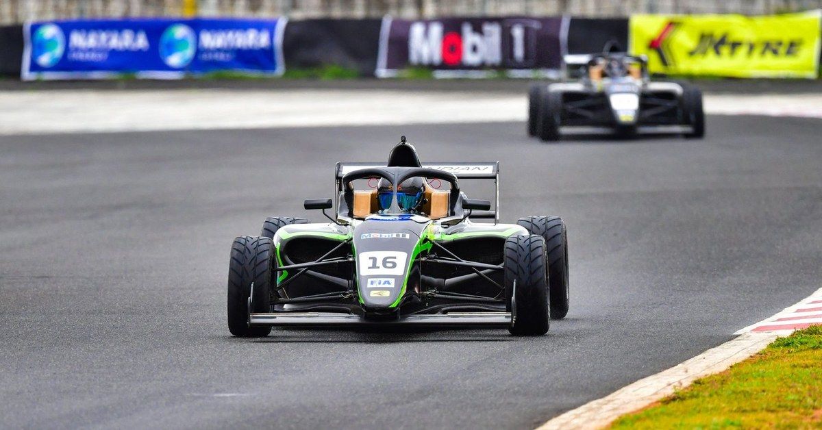 An F4 Indian Championship car leads at Kari Motor Speedway
