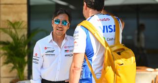 Ayao Komatsu, Team Principal of Haas F1 and Peter Bayer, CEO of Visa Cash App Racing Bulls talk in the Paddock during practice ahead of the F1 Grand Prix of Qatar at Lusail International Circuit on November 28, 2025 in Lusail City, Qatar.