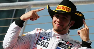 Lewis Hamilton celebrates victory at the 2012 United States Grand Prix