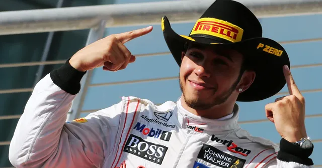 Lewis Hamilton celebrates victory at the 2012 United States Grand Prix