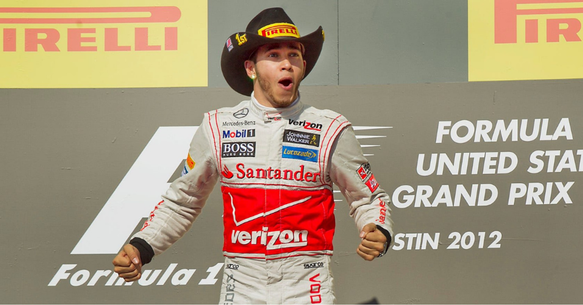 Lewis Hamilton celebrates victory at the 2012 United States Grand Prix