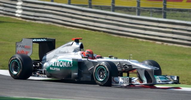 Michael Schumacher in the Mercedes MGP W02 in the first part of the Roggia chicane at Monza during second practice for the 2011 Italian Grand Prix.