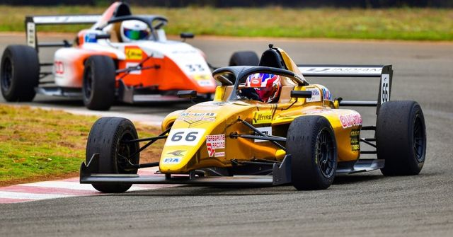 Two Mygale M21-F4 cars side by side in the F4 Indian Championship
