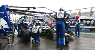 Yuki Tsunoda of Japan driving the (22) Visa Cash App Racing Bulls VCARB 02 makes a pitstop during the F1 Grand Prix of Australia at Albert Park Grand Prix Circuit on March 16, 2025 in Melbourne, Australia